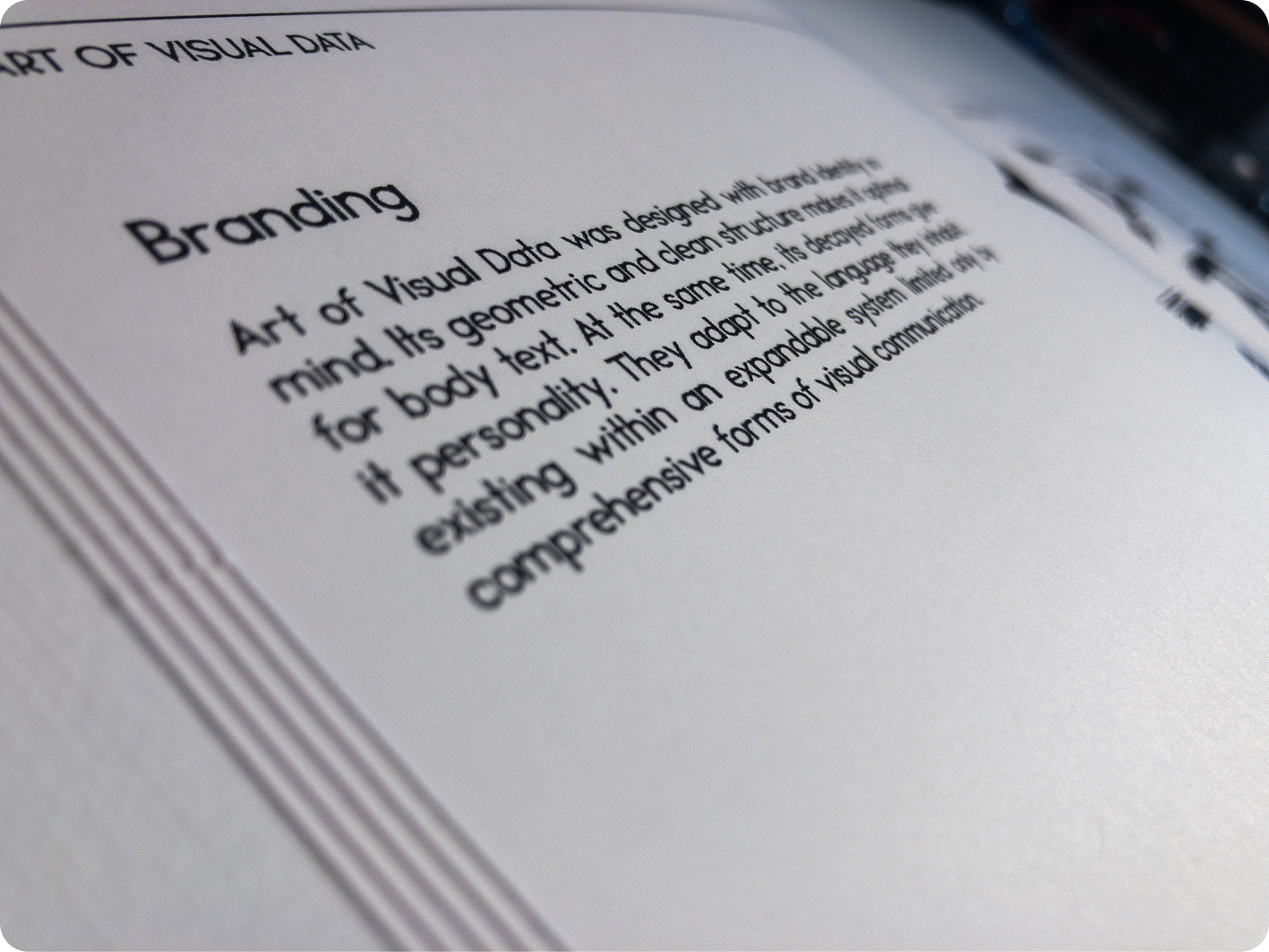 Close-up of the AoVD type specimen booklet showing a page about its brand application.