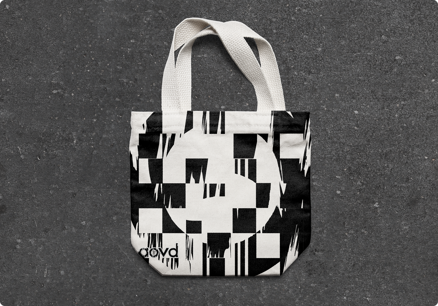 Tote bag with a modified lowercase 'a' in the AoVD: English font.